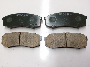 Image of Disc Brake Pad Set (Rear). A set of disc brake pads. image for your 2005 Toyota Tundra  Base Standard Cab Pickup Fleetside 